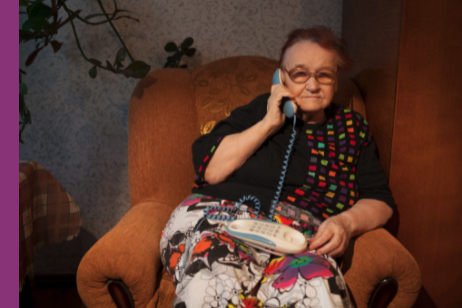 Elderly woman talking on the phone.
